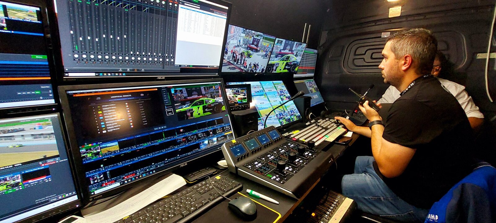 GP1 outside broadcast fleet at a racetrack
